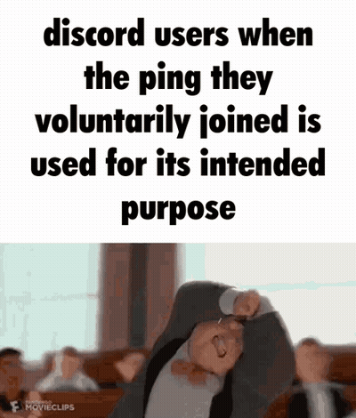 A Man In A Suit And Tie Is Making A Funny Face With His Arms Outstretched . GIF