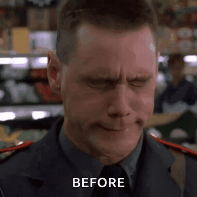 A Man In A Suit And Tie Is Making A Funny Face With His Eyes Closed And The Words Before Written On The Bottom . GIF