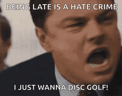 A Man In A Suit And Tie Is Making A Funny Face With The Caption Being Late Is A Hate Crime GIF
