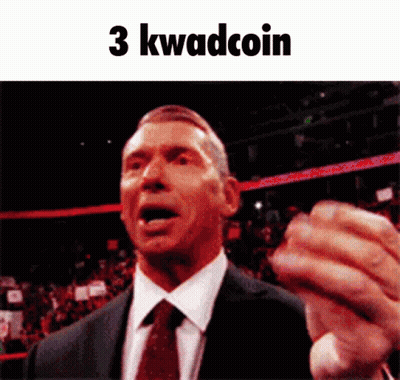 A Man In A Suit And Tie Is Making A Funny Face With The Words 3 Kwadcoin Written Above Him GIF