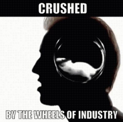 A Man In A Suit And Tie Is Making A Gesture With His Hands . GIF