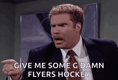 A Man In A Suit And Tie Is Pointing And Saying Give Me Some Damn Flyers Hockey GIF