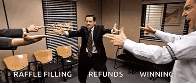 A Man In A Suit And Tie Is Pointing At Another Man In A Suit And Tie . GIF