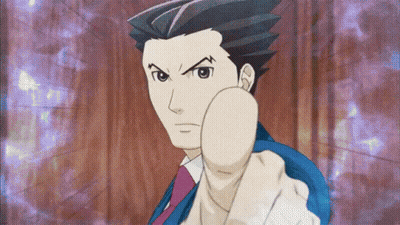 A Man In A Suit And Tie Is Pointing At Something GIF