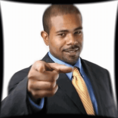 A Man In A Suit And Tie Is Pointing His Finger At The Camera GIF