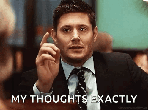 A Man In A Suit And Tie Is Pointing Up And Saying His Thoughts Exactly GIF