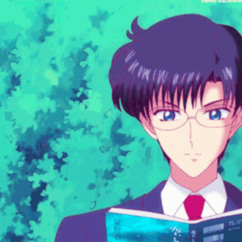 A Man In A Suit And Tie Is Reading A Book In Front Of A Green Background GIF