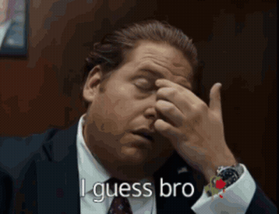 A Man In A Suit And Tie Is Rubbing His Forehead And Says " I Guess Bro " In White Letters GIF