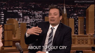 A Man In A Suit And Tie Is Saying About To Ugly Cry . GIF