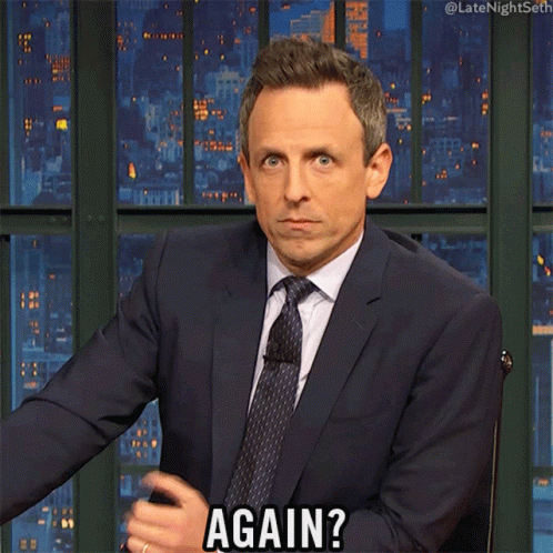 A Man In A Suit And Tie Is Saying " Again " GIF