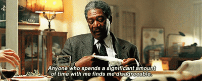 A Man In A Suit And Tie Is Saying Anyone Who Spends A Significant Amount Of Time With Me Finds Me Unagreeable GIF