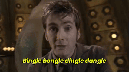 A Man In A Suit And Tie Is Saying Bingle Bongle Dingle Dangle . GIF