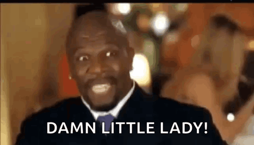 A Man In A Suit And Tie Is Saying `` Damn Little Lady '' . GIF
