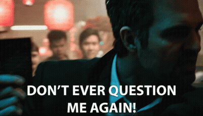 A Man In A Suit And Tie Is Saying " Do N't Ever Question Me Again " GIF
