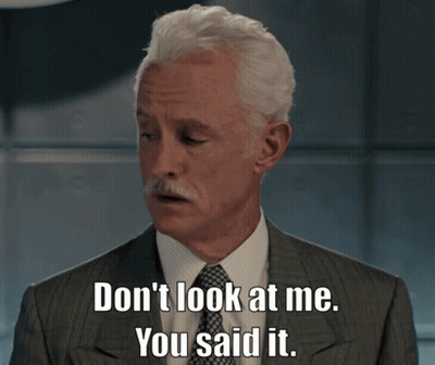 A Man In A Suit And Tie Is Saying " Don 'T Look At Me You Said It " GIF