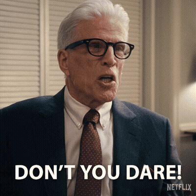 A Man In A Suit And Tie Is Saying " Don 'T You Dare " GIF