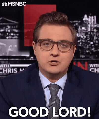 A Man In A Suit And Tie Is Saying " Good Lord " GIF