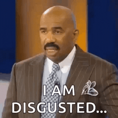 A Man In A Suit And Tie Is Saying `` I Am Disgusted ... '' GIF