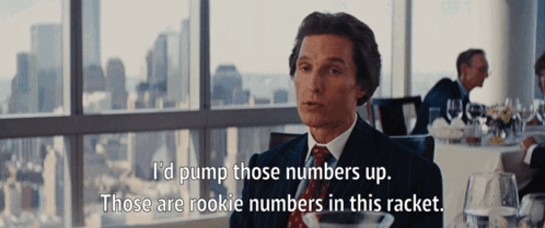 A Man In A Suit And Tie Is Saying I 'D Pump Those Numbers Up GIF