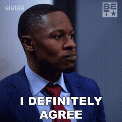 A Man In A Suit And Tie Is Saying " I Definitely Agree " GIF