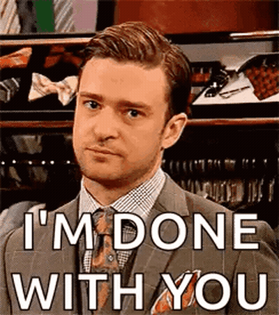 A Man In A Suit And Tie Is Saying `` I 'M Done With You '' GIF