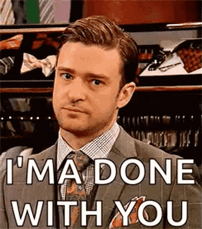 A Man In A Suit And Tie Is Saying `` I 'M Done With You '' GIF