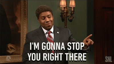 A Man In A Suit And Tie Is Saying " I 'M Gonna Stop You Right There " GIF