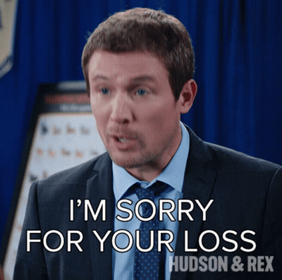 A Man In A Suit And Tie Is Saying I 'M Sorry For Your Loss GIF