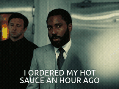 A Man In A Suit And Tie Is Saying I Ordered My Hot Sauce An Hour Ago GIF