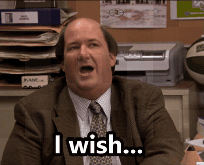 A Man In A Suit And Tie Is Saying " I Wish " GIF