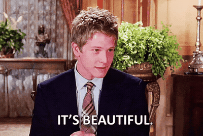 A Man In A Suit And Tie Is Saying " It 'S Beautiful " GIF