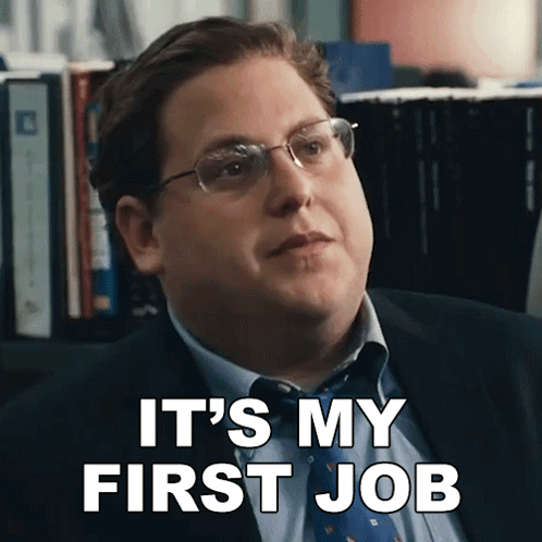 A Man In A Suit And Tie Is Saying It 'S My First Job GIF