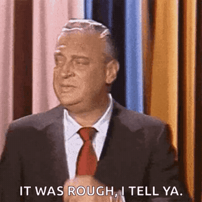 A Man In A Suit And Tie Is Saying It Was Rough I Tell Ya GIF