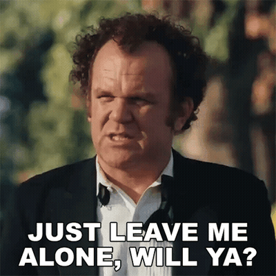 A Man In A Suit And Tie Is Saying " Just Leave Me Alone , Will Ya ? " GIF