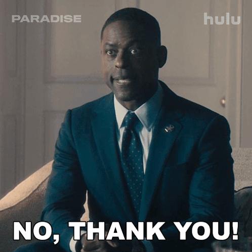 A Man In A Suit And Tie Is Saying " No Thank You " GIF