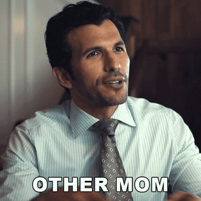 A Man In A Suit And Tie Is Saying Other Mom GIF