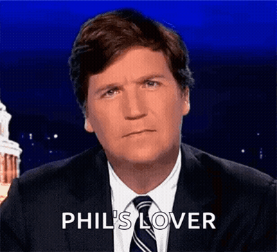A Man In A Suit And Tie Is Saying Phil 'S Lover GIF