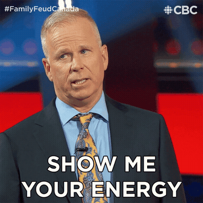 A Man In A Suit And Tie Is Saying " Show Me Your Energy " GIF