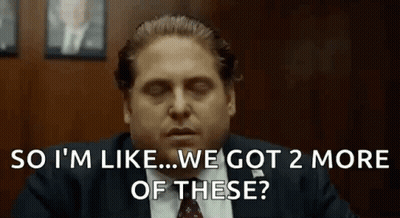 A Man In A Suit And Tie Is Saying `` So I 'M Like ... We Got 2 More Of These '' GIF