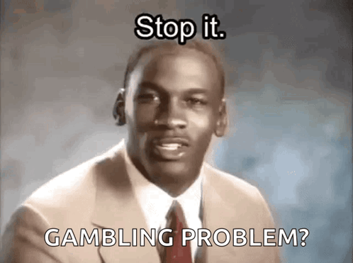 A Man In A Suit And Tie Is Saying `` Stop It Gambling Problem '' . GIF