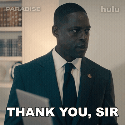 A Man In A Suit And Tie Is Saying " Thank You Sir " GIF
