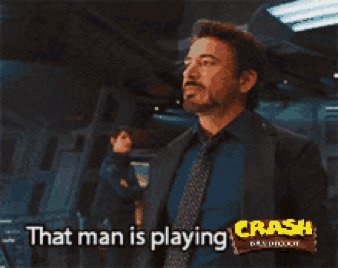 A Man In A Suit And Tie Is Saying That Man Is Playing Crash GIF