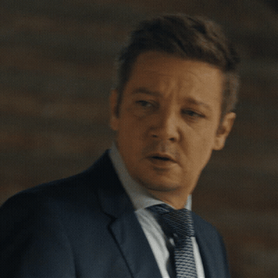 A Man In A Suit And Tie Is Saying " That 'S The Spirit " GIF