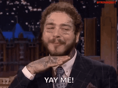 A Man In A Suit And Tie Is Saying Yay Me GIF