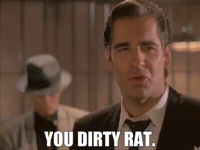 A Man In A Suit And Tie Is Saying " You Dirty Rat " GIF