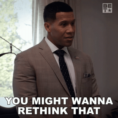 A Man In A Suit And Tie Is Saying You Might Wanna Rethink That GIF