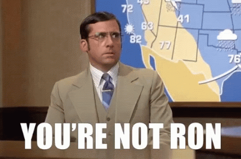 A Man In A Suit And Tie Is Saying You 'Re Not Ron . GIF