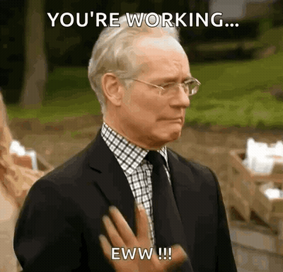 A Man In A Suit And Tie Is Saying You 'Re Working Eww ! GIF