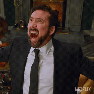 A Man In A Suit And Tie Is Screaming In Front Of A Fireplace With A Netflix Logo In The Corner GIF