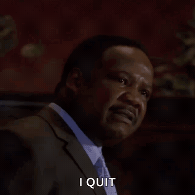 A Man In A Suit And Tie Is Screaming With The Words I Quit Behind Him GIF